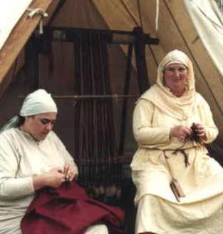 * A warp weighted loom in a tent