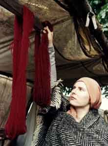 * Hanks of dyed wool being hung up to dry